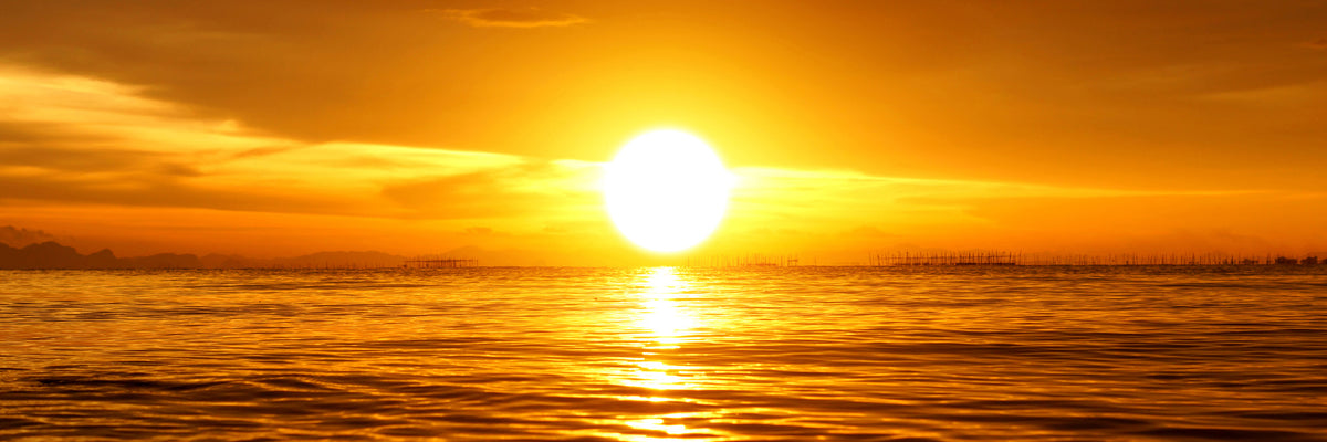 panoramic-3-piece-canvas-print-glowing-sunset-on-the-water-panorama